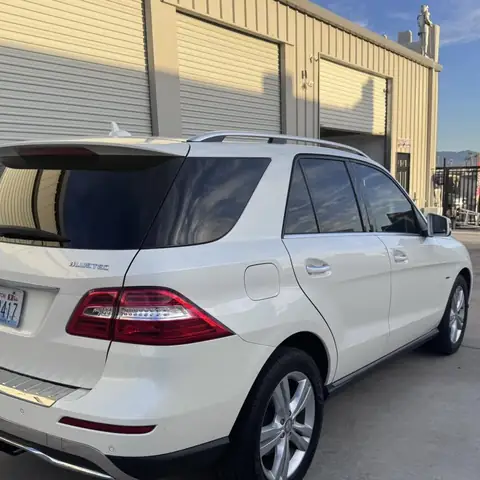 Mercedes SUV window tint: 15% over rear half privacy windows, 25% front doors, 50% full windshield (view 2)