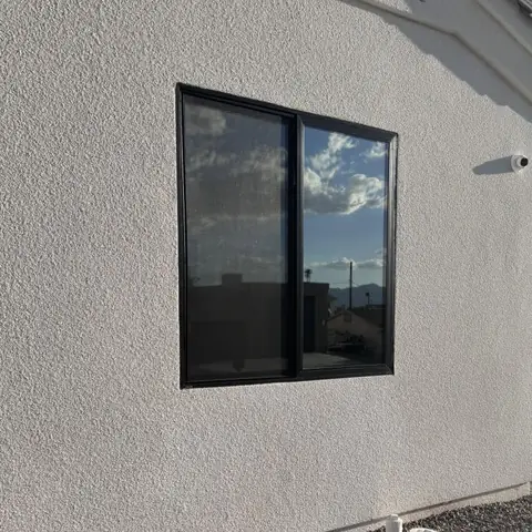 New home in 35% dual reflective film: Some flat glass action today, Adding some solar protection and additional privacy for this new home. 35% dual