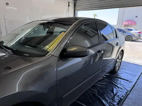 Nissan Altima window tint: 15% rear 3 windows, 35% front doors, 5% sunstrip