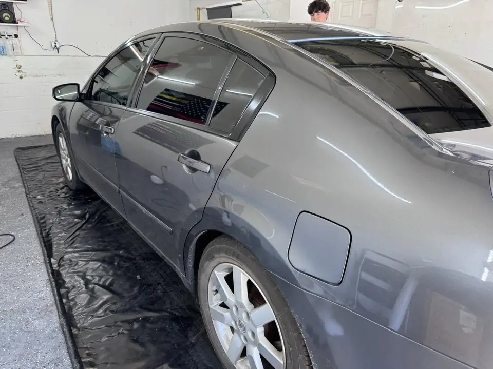 Nissan Altima window tint: 15% rear 3 windows, 35% front doors, 5% sunstrip (view 2)