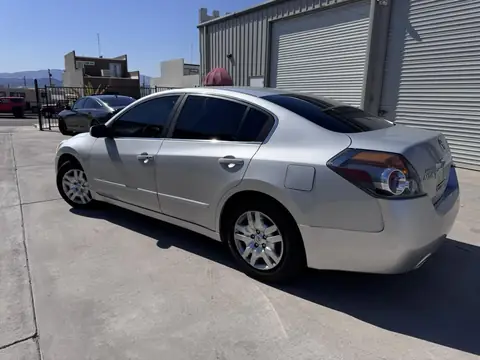 Nissan Altima window tint: Nissan Altima in for some sun protection, 5% on the rear half, 25% on the front doors