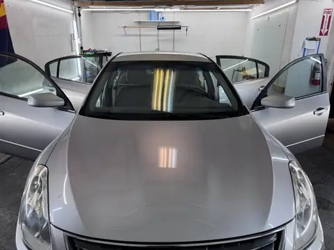 Nissan Altima window tint: 5% C-IR all around and sun strip