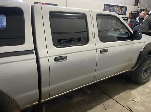 Nissan Frontier window tint: 25% fronts, 20% rear, 5% visor (view 2)