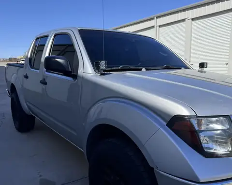 Nissan Frontier window tint: 5% sides and rear, 35% full windshield, 5% sunstrip (view 2)