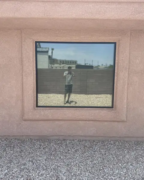Office door and windows in dual reflective film: We installed our dual reflective 5% on the entry door and break room window, And installed our 35% (view 5)