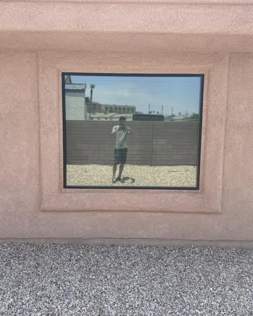 Office door and windows in dual reflective film: We installed our dual reflective 5% on the entry door and break room window, And installed our 35% (view 5)