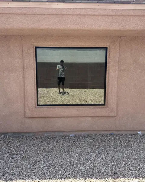 Office door and windows in dual reflective film: We installed our dual reflective 5% on the entry door and break room window, And installed our 35% (view 7)