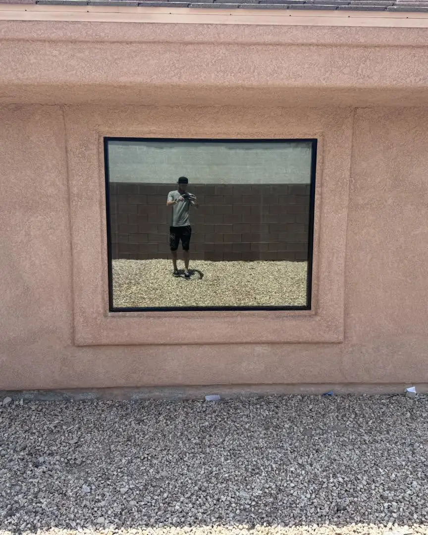 Office door and windows in dual reflective film: We installed our dual reflective 5% on the entry door and break room window, And installed our 35% (view 7)