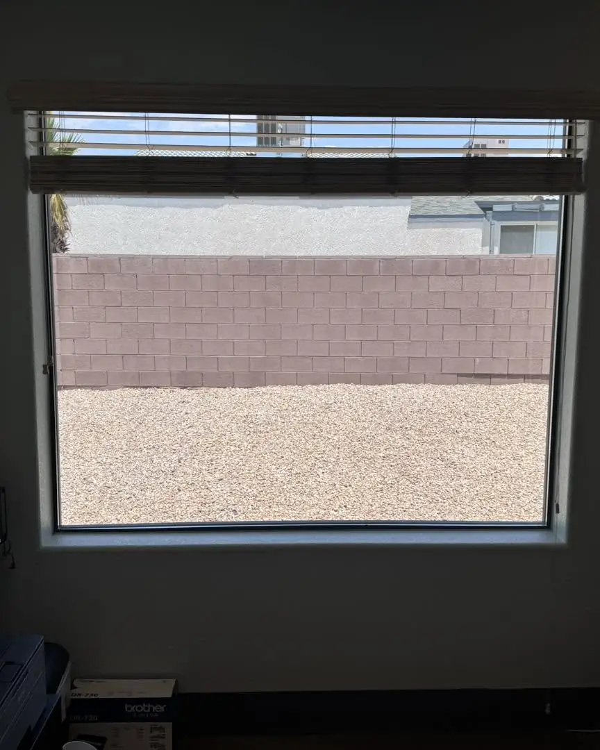 Office door and windows in dual reflective film: We installed our dual reflective 5% on the entry door and break room window, And installed our 35% (view 8)