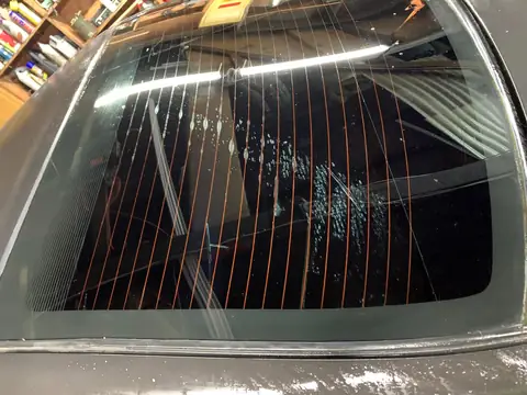 Old tint removal and carbon re-tint: Removed the old cheap tint and replaced it with premium carbon 5%