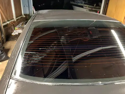 Old tint removal and carbon re-tint: Removed the old cheap tint and replaced it with premium carbon 5% (view 2)