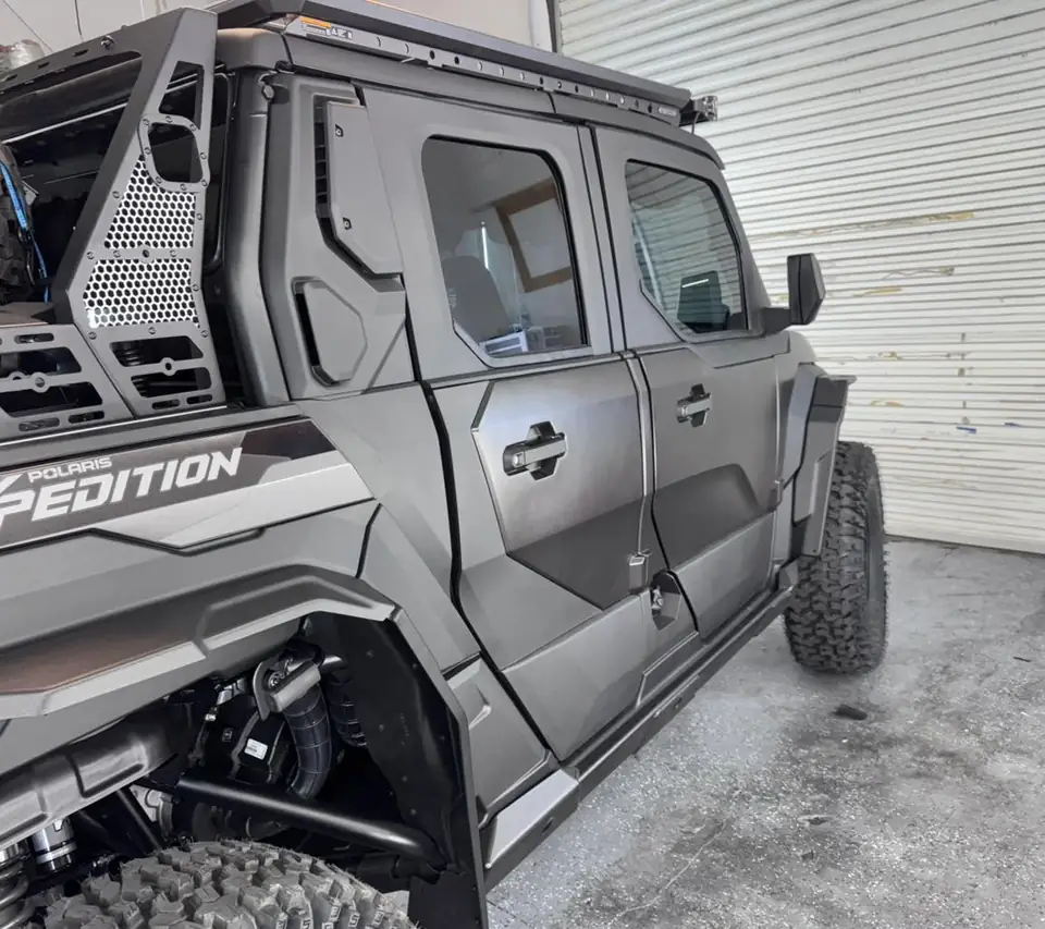 Polaris Xpedition window tint: 5% C-IR rear half, 25% C-IR front doors, 50% C-IR full windshield (view 2)