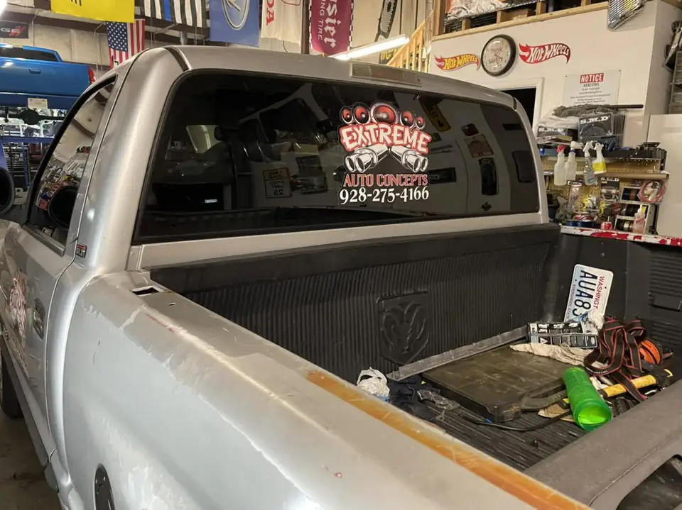 Ram 1500 single cab window tint: Fully custom install, Top and bottom brow on windshield, 20% top 1/3 of side windows, 5% bottom 2/3 of side windows (view 4)