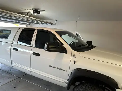 Ram 2500 window tint: Removed faded front doors and sun visor, Installed new 20% ceramic front doors and new 5% sun visor