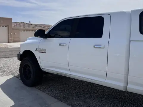 Ram 2500 window tint: 5% Carbon Ceramic rear doors and rear 3piece window, 3% Carbon Ceramic front doors to match rear, 3% Sunstrip