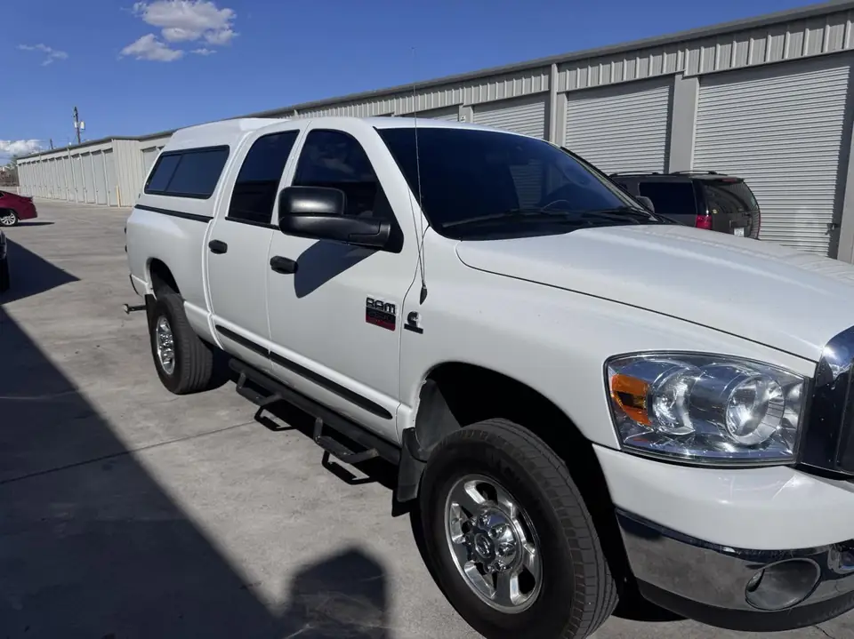 Ram 2500 window tint: Removal on the two front doors and install new 25% C-IR, And 50% C-IR for the full windshield (view 3)