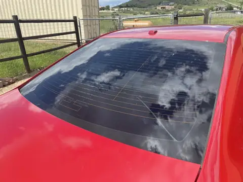 Red sedan window tint: Full vehicle removal of old-faded tint, Premium ceramic 15% all the way around, Premium ceramic 70% full windshield