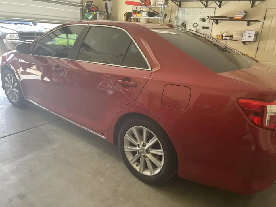 Red sedan window tint: Full vehicle removal of old-faded tint, Premium ceramic 15% all the way around, Premium ceramic 70% full windshield (view 3)