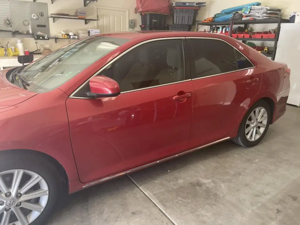 Red sedan window tint: Full vehicle removal of old-faded tint, Premium ceramic 15% all the way around, Premium ceramic 70% full windshield (view 4)