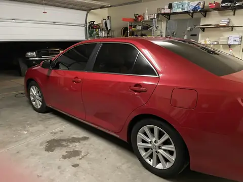 Red sedan window tint: Full vehicle removal of old-faded tint, Premium ceramic 15% all the way around, Premium ceramic 70% full windshield (view 5)
