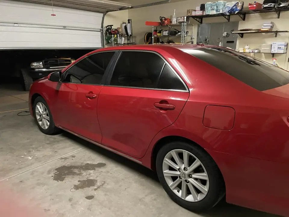 Red sedan window tint: Full vehicle removal of old-faded tint, Premium ceramic 15% all the way around, Premium ceramic 70% full windshield (view 5)