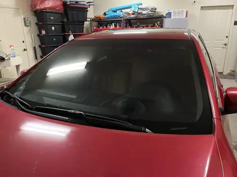 Red sedan window tint: Full vehicle removal of old-faded tint, Premium ceramic 15% all the way around, Premium ceramic 70% full windshield (view 7)