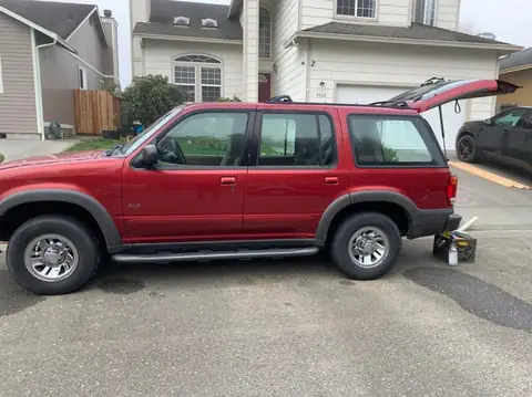 Red SUV window tint: Customer reached out had me install pre-cut they ordered 5% on the rear five windows 50% on the front two doors