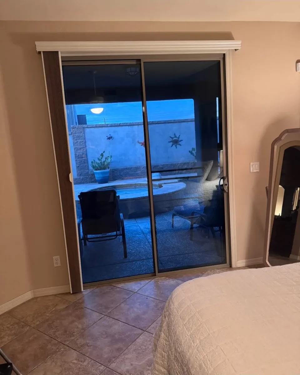 Tinted sliding glass door in a home