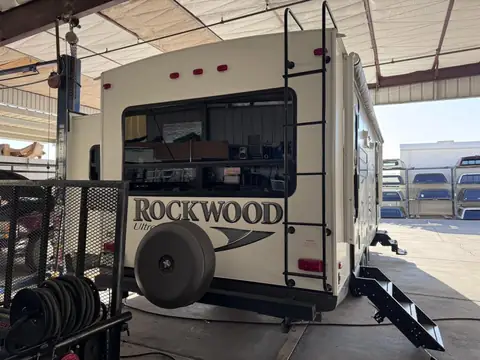 Rockwood travel trailer, 15% over factory smoked glass: We added a 15% over the factory smoked glass on this one to cut down the heat coming in and