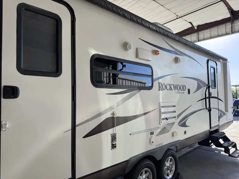 Rockwood travel trailer, 15% over factory smoked glass: We added a 15% over the factory smoked glass on this one to cut down the heat coming in and (view 2)