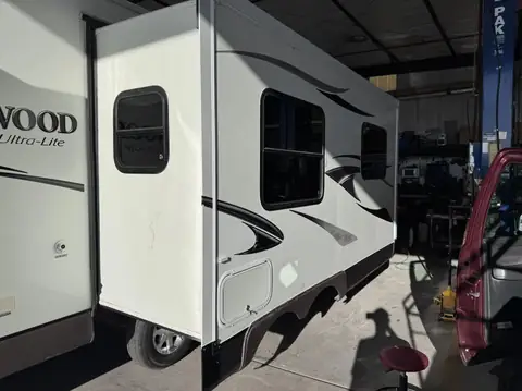 Rockwood travel trailer, 15% over factory smoked glass: We added a 15% over the factory smoked glass on this one to cut down the heat coming in and (view 3)