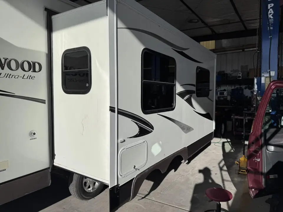 Rockwood travel trailer, 15% over factory smoked glass: We added a 15% over the factory smoked glass on this one to cut down the heat coming in and (view 3)
