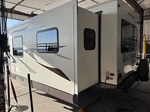 Rockwood travel trailer, 15% over factory smoked glass: We added a 15% over the factory smoked glass on this one to cut down the heat coming in and (view 4)