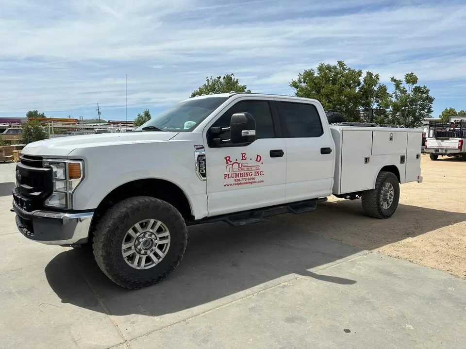 Service body work truck with tinted cab windows