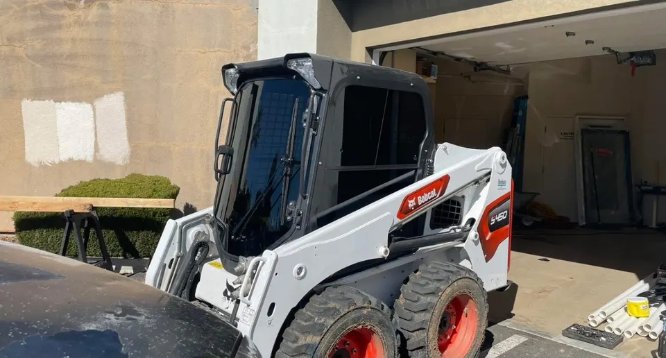 Bobcat skid steer in for cab glass film
