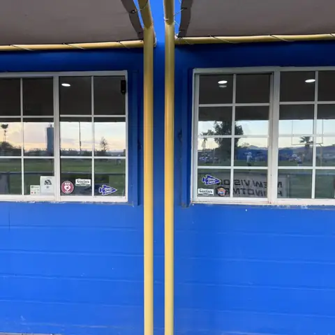 Snack shack windows in dual reflective film: Installed 25% dual reflective on 3 windows and 35% dual reflective on the main left sliding window (view 2)
