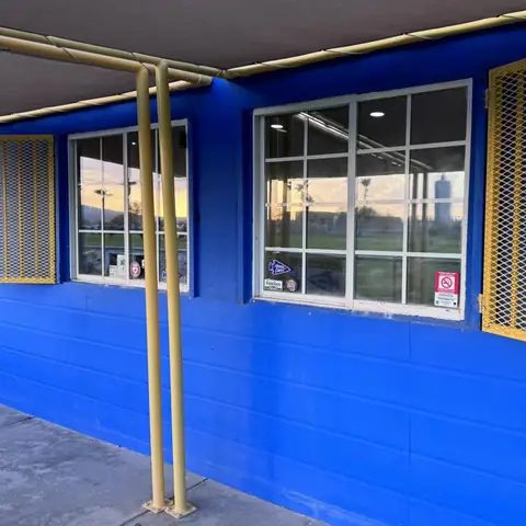 Snack shack windows in dual reflective film: Installed 25% dual reflective on 3 windows and 35% dual reflective on the main left sliding window (view 3)