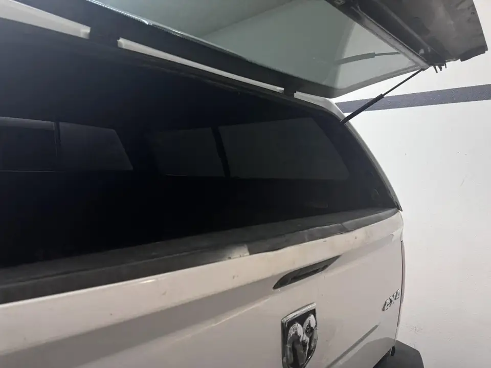 SnugTop camper shell in 3% carbon ceramic: Added some extra privacy for this SnugTop with our 3% Carbon Ceramic over the privacy glass (view 2)