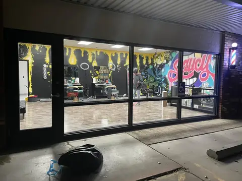Storefront window film removal: Removed all old film off all the windows (view 2)