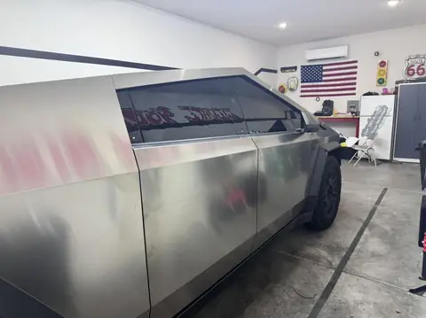 Tesla Cybertruck window tint: 20% Carbon Ceramic over rear privacy windows, 5% Carbon Ceramic front doors and pockets (view 2)