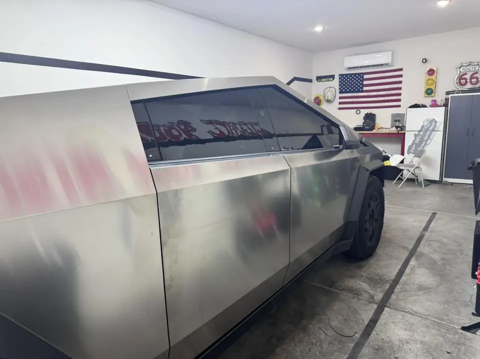 Tesla Cybertruck window tint: 20% Carbon Ceramic over rear privacy windows, 5% Carbon Ceramic front doors and pockets (view 2)