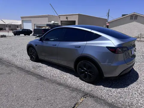 Tesla Model Y window tint: 15% Nano Ceramic rear windows, 20% Nano Ceramic front doors (view 2)
