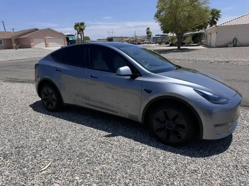 Tesla Model Y window tint: 15% Nano Ceramic rear windows, 20% Nano Ceramic front doors (view 3)