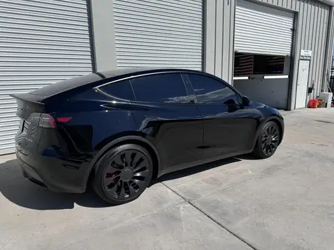 Tesla Model Y window tint: Remove tint from front doors, 3% front doors, 35% full windshield (view 2)