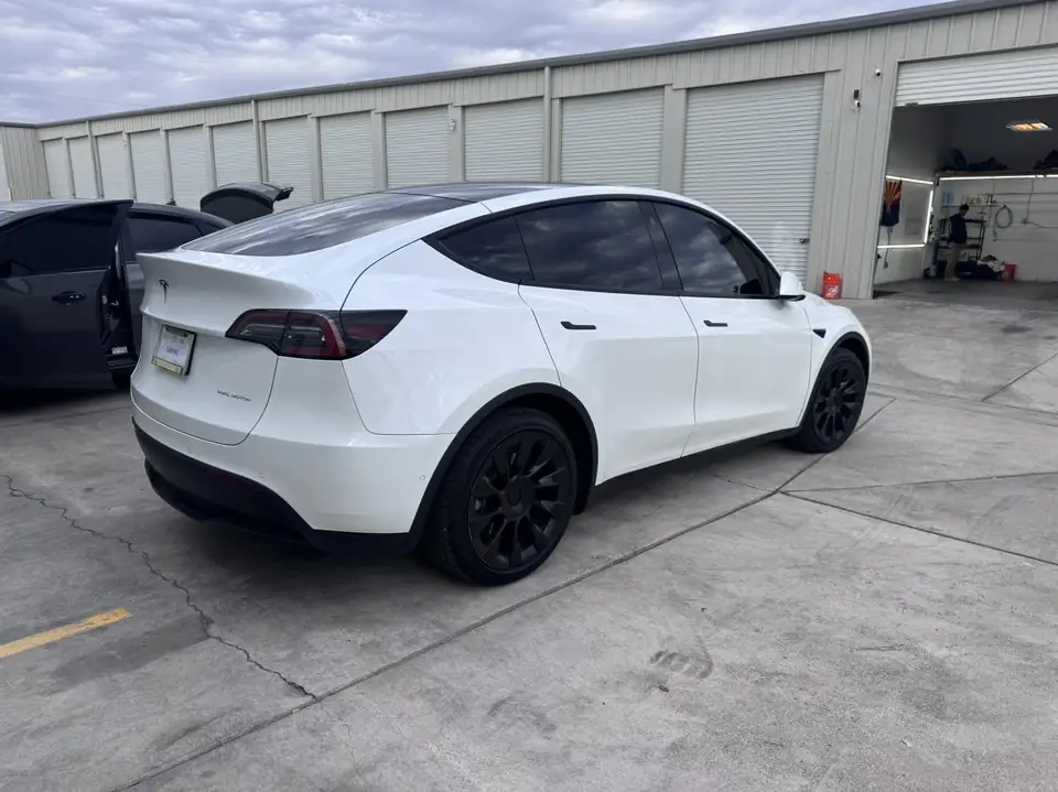 Tesla Model Y window tint: 5% C-IR sides and rear hatch, 50% C-IR full windshield (view 2)
