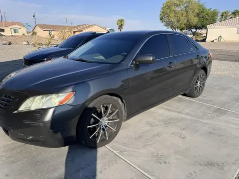 Toyota Camry window tint: 5% Carbon Ceramic all sides and rear, 5% sun strip