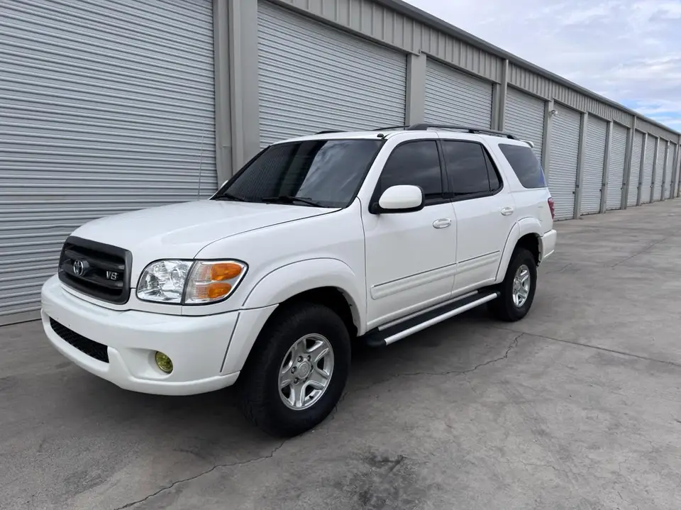 Toyota Sequoia window tint: 5% over rear half privacy windows, 20% front doors, 50% full windshield, 5% sunstrip (view 2)