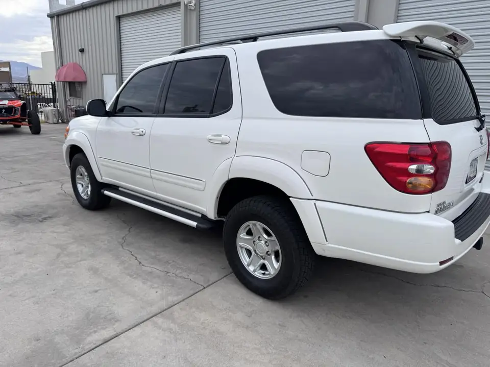 Toyota Sequoia window tint: 5% over rear half privacy windows, 20% front doors, 50% full windshield, 5% sunstrip (view 4)