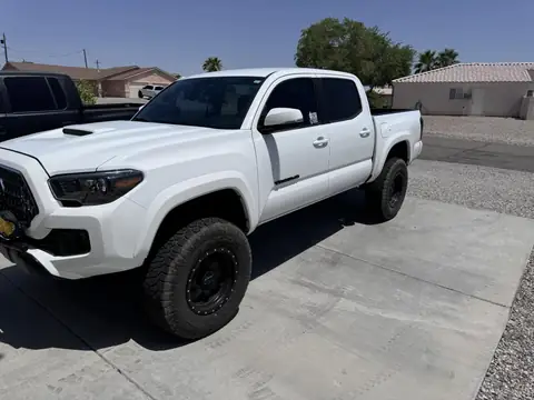 Toyota Tacoma window tint: Removed faded tint from front doors, 3% all sides and rear windows, 50% full windshield, 5% sunstrip