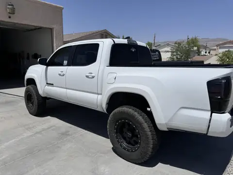 Toyota Tacoma window tint: Removed faded tint from front doors, 3% all sides and rear windows, 50% full windshield, 5% sunstrip (view 2)